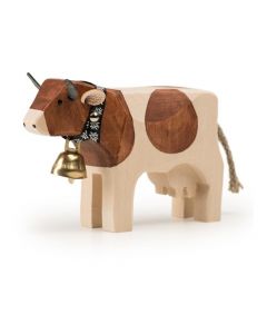Kuh aus Holz, mit Glocke, braun gefleckt