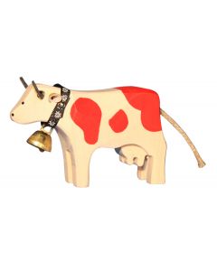 Kuh aus Holz, mit Glocke, rot gefleckt